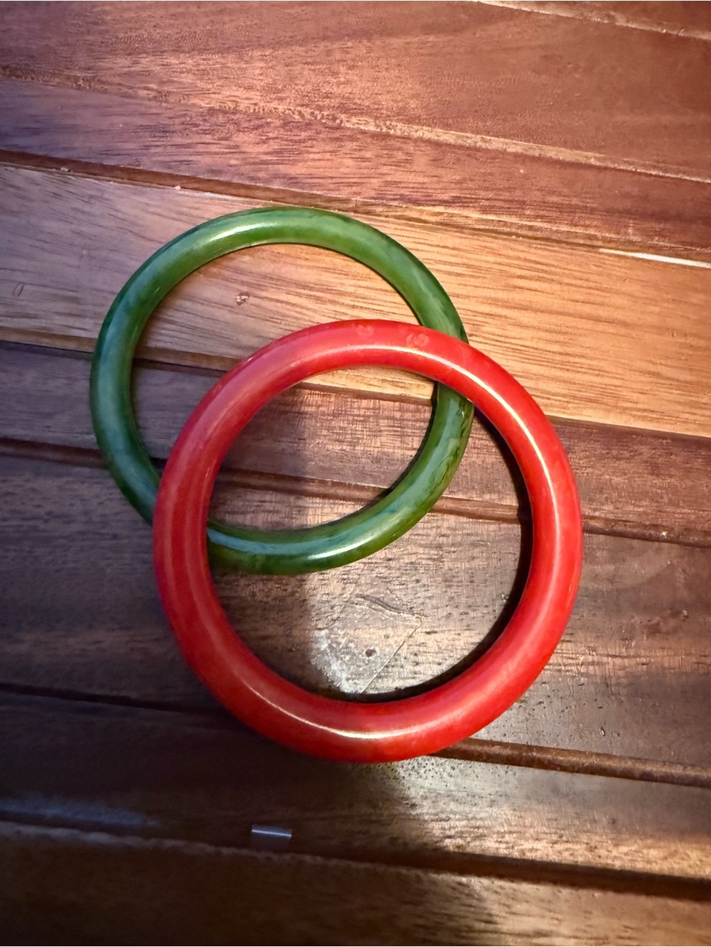 Marbled red and marbled green Bakelite bangles.